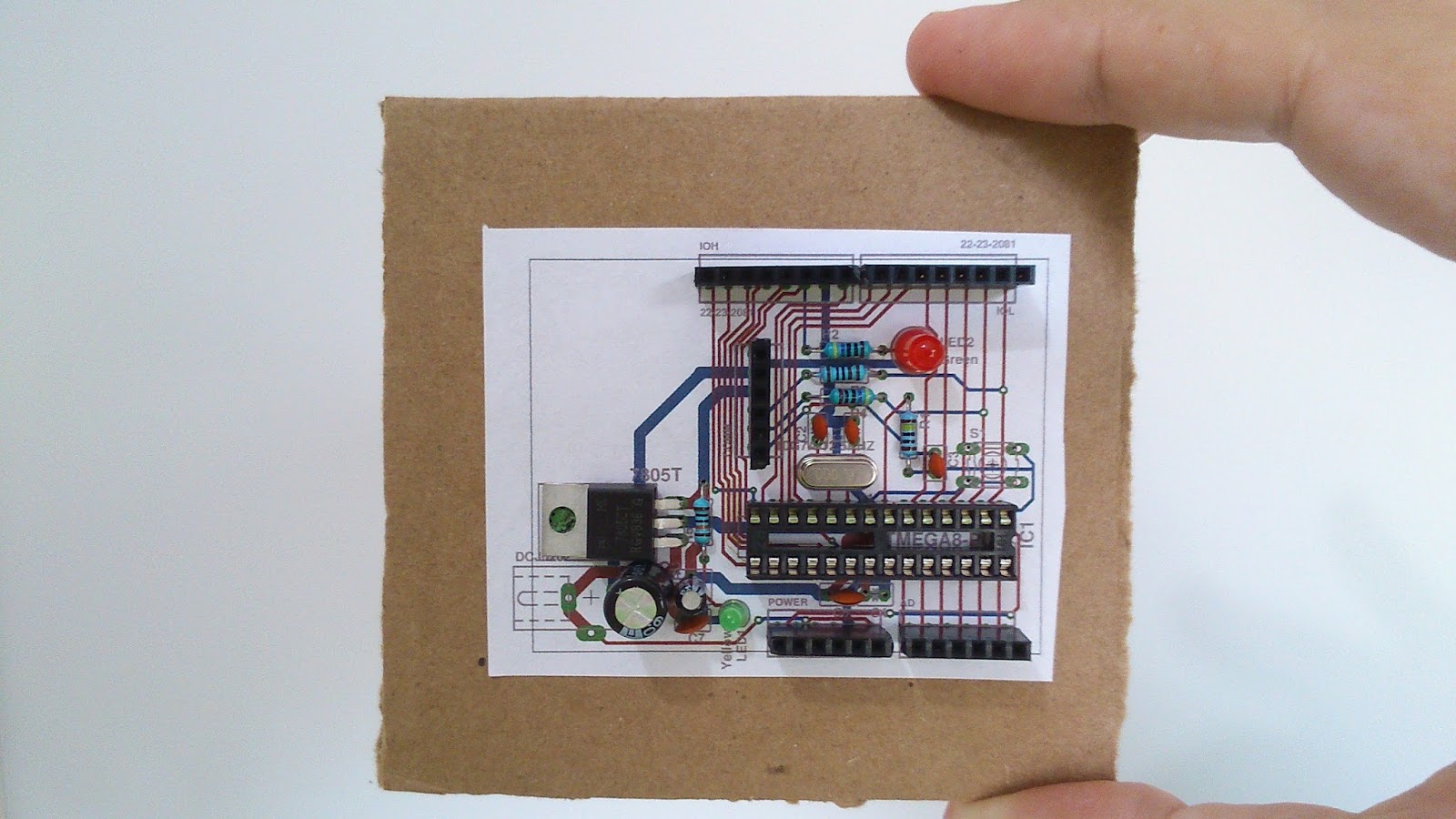 A PCB mockup out of cardboard