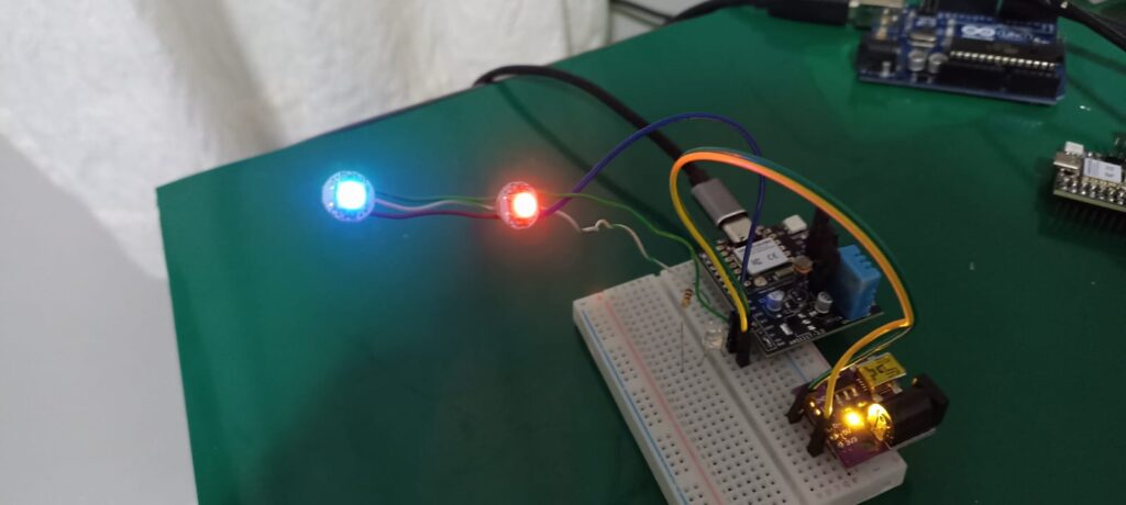 The two WS2812b LEDs blinking with ESP32-C6