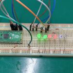 raspberry pi pico 2 electronic dice on a breadboard