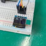 0.49" OLED display on a breadboard