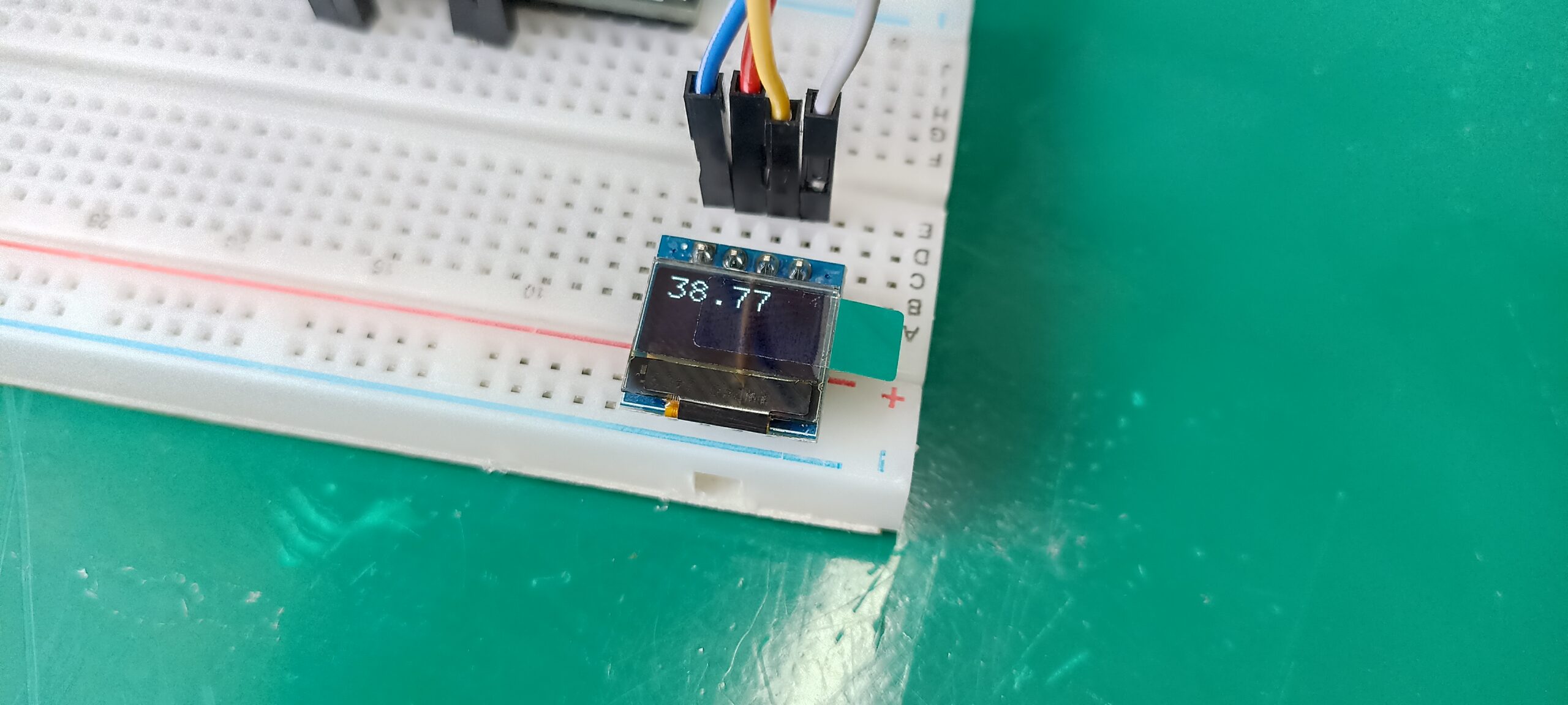 0.49" OLED display on a breadboard
