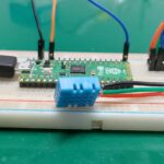 DHT11 on a breadboard with raspberry pi pico 2